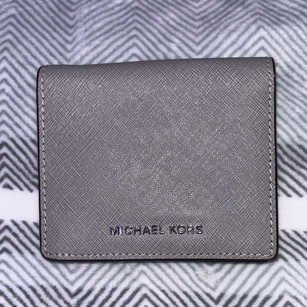 Barely used Michael Kors mini bifold wallet